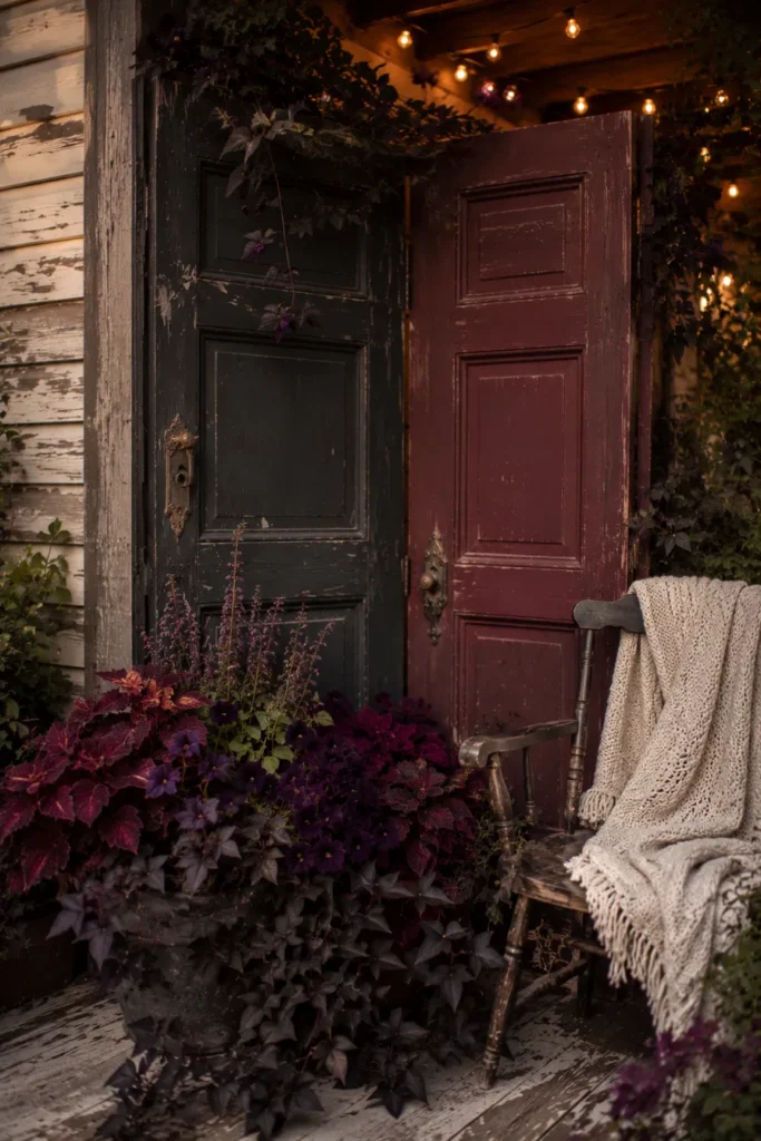 Painted vintage doors on porch as a privacy screen